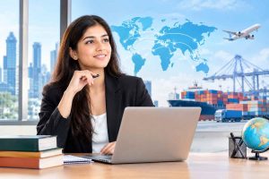 PGDM in International Business student exploring global trade, international logistics, and career opportunities using a laptop and world map.